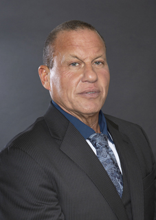 Alan Nahmias, President